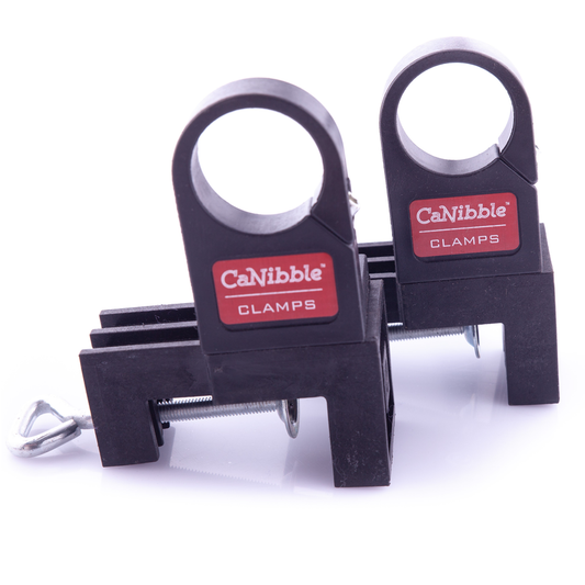 A front view of two CaNibble clamps.